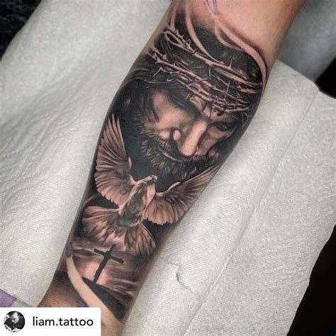 jesus christ forearm tattoo